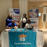 A Picture that shows 4 of Negxy Staff at the SEED Business School Festival in Lagos 